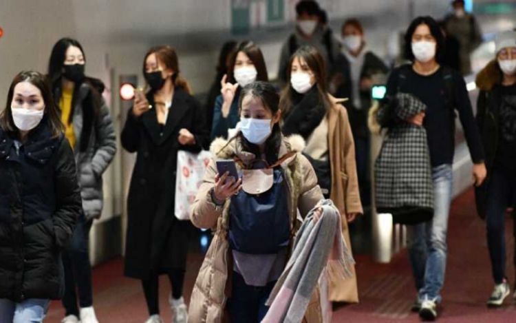 Pekín levanta obligatoriedad de usar mascarilla en espacios abiertos
