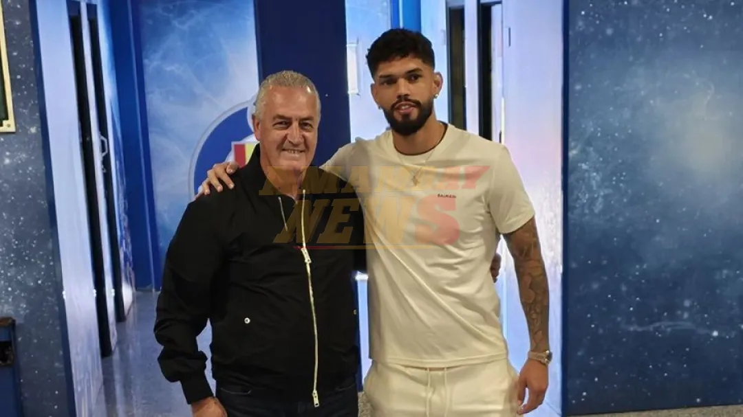 Gustavo Alfaro, con la muralla Omar Alderete